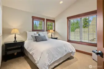 Bedroom three is upstairs and has beautiful blue or snowy sky views.