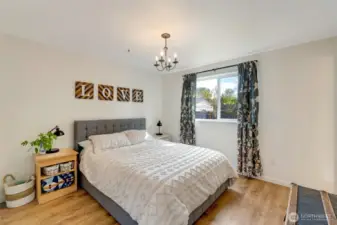 Primary bedroom with three quarter en suite bathroom.