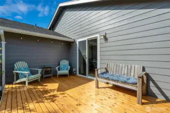 Sliding glass door leads to kitchen and dining area.