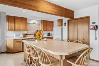 Pantry closet to the right provides lots of kitchen storage.