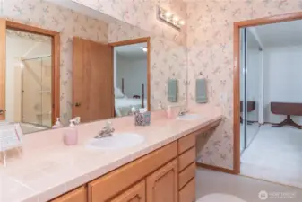 Jack and Jill bathroom features double sinks and a tub/shower combo—perfect for shared convenience without sacrificing space or style.
