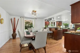 Formal dining room with open access to kitchen