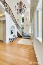 Wrought iron handrail and Italian crystal chandelier