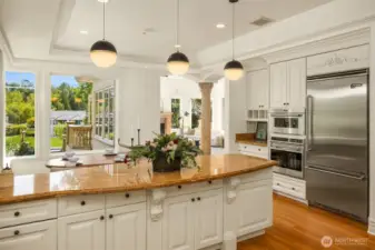 Kitchen looking out to the lake and backyard