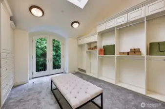 Master bedroom walk-in closet with balcony