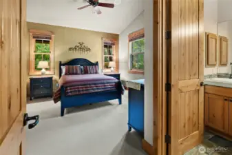 Main floor bedroom two with en-suite.