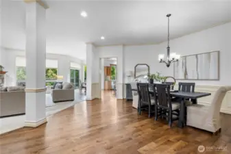 Formal dining room with elegant molding and space to entertain in style.