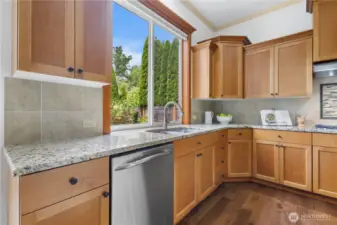 Custom tile backsplash elevates the kitchen’s style.