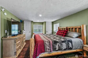 Primary bedroom with his and hers closets