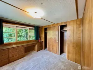 Large windows in the bedroom.