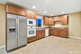 2nd Home Kitchen with laundry room for extra income, includes separate meter.