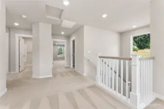 Stairs feature a timeless wooden open railing. Pictures are for representational purposes only, colors and features may vary.