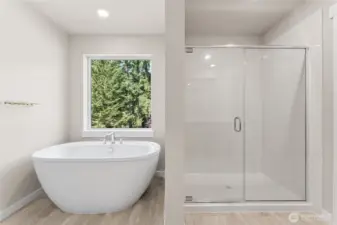 Soak away your stress in your freestanding tub in the primary bathroom. Pictures are for representational purposes only, colors and features may vary.
