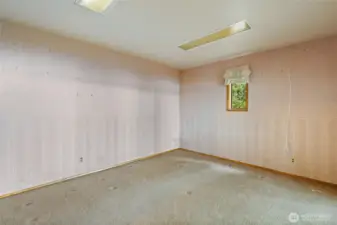 Primary room in ADU on main floor.