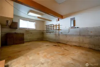 Unfinished space in the ADU. Would be great for a work shop or all of your beach toys.