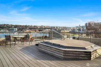 Enjoy views of city skyline and Space Needle from community rooftop