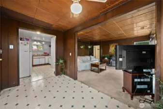 Flowing into the living room and hallway to the beds and bath beyond.