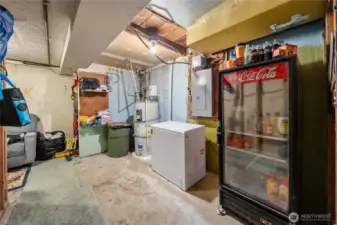 Looking back toward the stairs and bonus room (left past the grey chair).