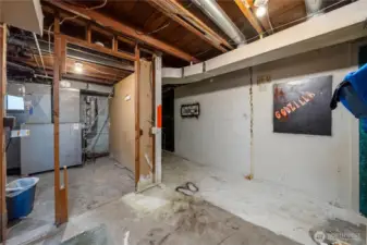 Showing the location of the utility room to the back door. And more open storage area.