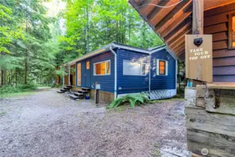 Back corner of lot showing spacious grounds and multiple structures