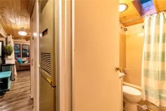 Bathroom entry with tub/shower combo  and vanity