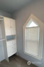 A look at a small portion of the Master Bedroom WALK-IN CLOSET w/natural light.