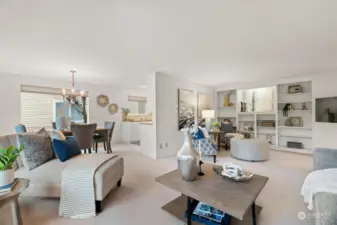 Open living room with custom built-ins.