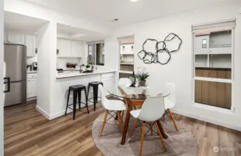 Bright dining room just off the kitchen.