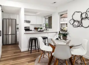 Dining room + kitchen.