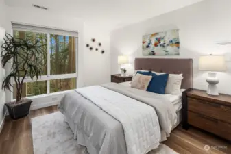 Primary bedroom offers a peaceful retreat with ample privacy.