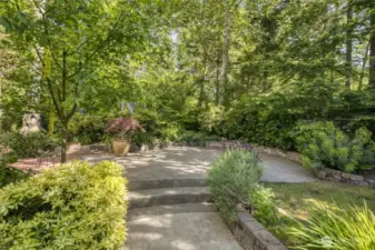 Access this patio via the slider from the primary suite.  The back yard is fully fenced, very private, and pet friendly.