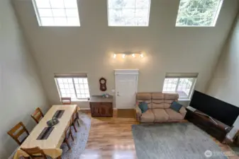 Looking down at the main living space from the upper landing.