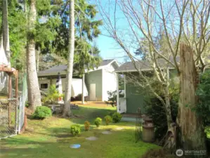Strolling between the RV garage and the art studio, we see the first part of the private back yard.