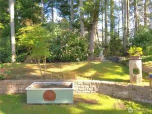 Gorgeous, mature landscaping graces the area.