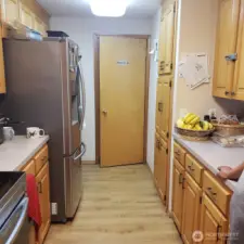 Kitchen access to Caregiver Rm