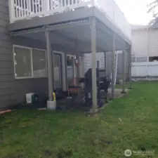 Under Deck Patio & Access to Basement.