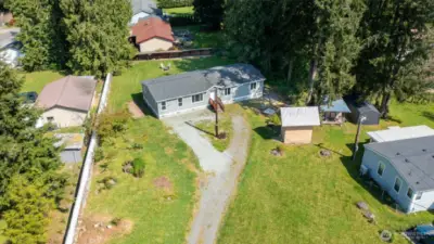 Nice storage shed with metal room and loft.