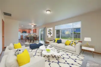 A picture-Perfect Home! Large windows bathe the room in natural light, while the slider door opens to a private, peaceful backyard, extending your living space and bringing the outdoors in.