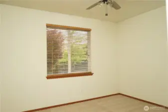 Second bedroom is on the opposite end of the home looking to the back yard.
