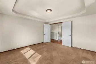Double doors at primary bedroom
