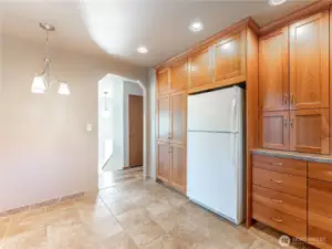 Main floor kitchen and hallway to bedrooms and bathrooms