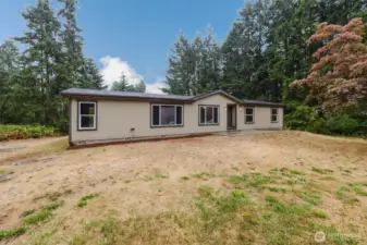 Front exterior of home showcasing single-level layout.