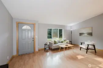 Bright front entry opening to spacious living room.