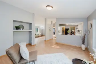 Living room with built-in shelving and cozy atmosphere.