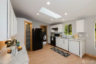 Kitchen with backyard access and open feel.