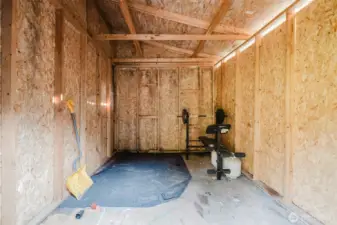 Interior view of storage shed or workshop space.