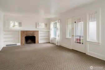 Welcome to large living room that is connected to the dining room.