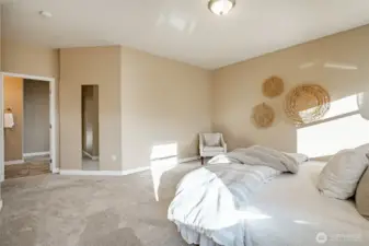 Primary Suite - new carpet, 9' ceiling and lots of natural light
