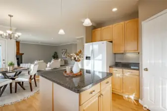 Kitchen looking back at the dining and living room - great open concept space