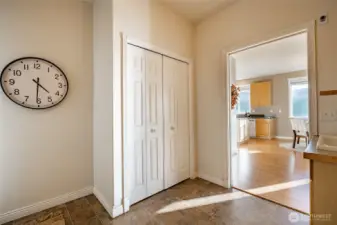 Spacious laundry room with wash sink and large closet